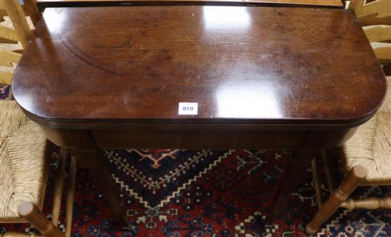 A George III mahogany folding top tea or card table, W.91cm